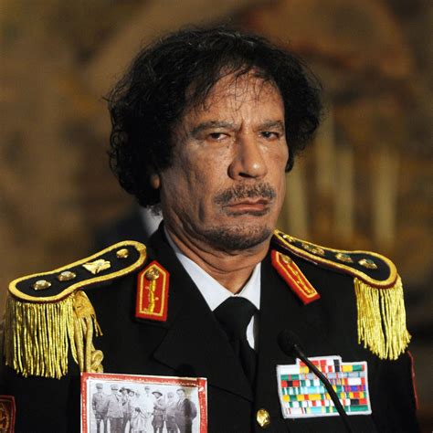Muammar Gaddafi ir jo 