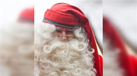 Kalėdų Senelis klausosi vaiko eilėraščio