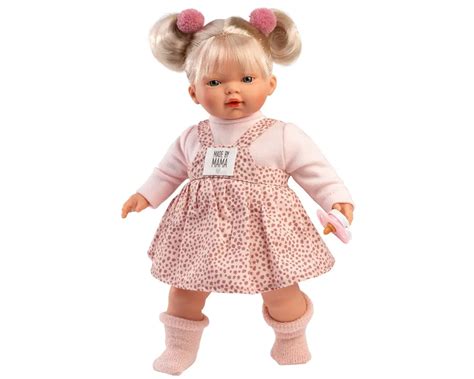 Nuotrauka su pirmosios Sbrodolinos lėlės komplektu: rožine suknele ir baltomis pižamomis