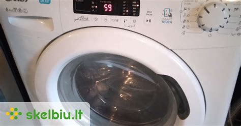 skalbimo mašina su Judes vystyklų