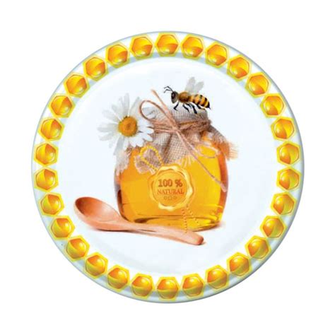 Stiklainis medaus su šaukštu