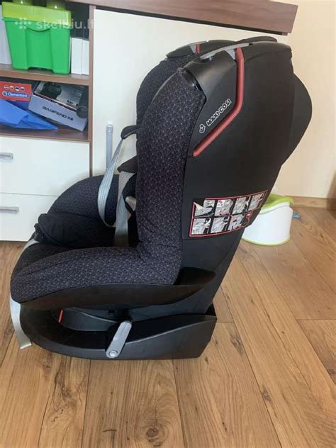 Vaikiška automobilinė kėdutė su Disney personažais ir nuolaidos simbolis