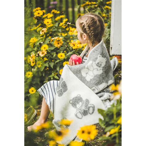 Vilnonis vaikiškas megztukas su raštais