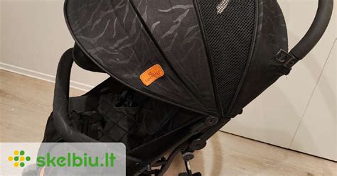 Kompaktiškas vežimėlis su vaiku