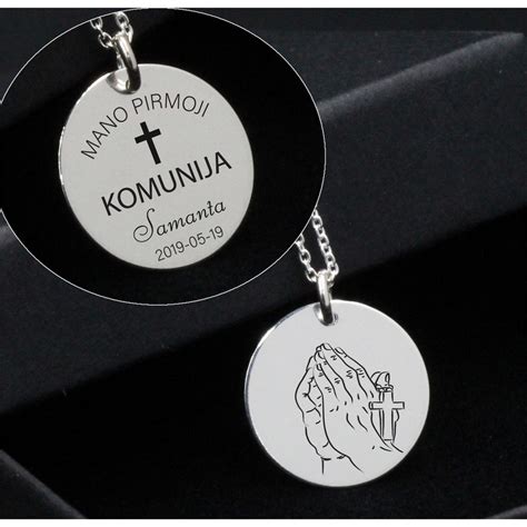 Simboliniai pakabukai berniuko Komunijos maišeliams