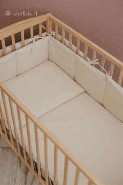 vaikiškos lovytės saugos detalės