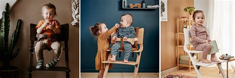 Vaikas sėdintis CAM maitinimo kėdutėje