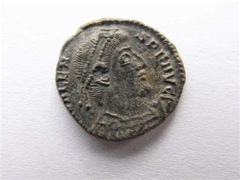 Senovės Romos monetos su imperatoriaus Oktaviano Augusto atvaizdu