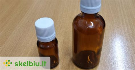 medikamentų buteliukai su tabletėmis