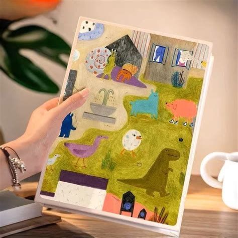 Vaikiško nuotraukų albumo viršelis su žaismingais elementais