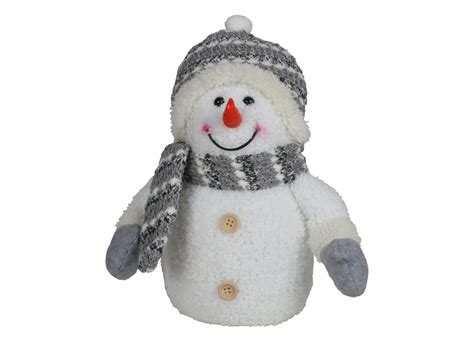 Vaikiškas sniego senis su skara ir morkos nosimi