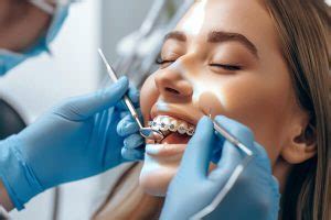 Ortodontinių aparatų palyginimas: fiksuoti vs. išimami